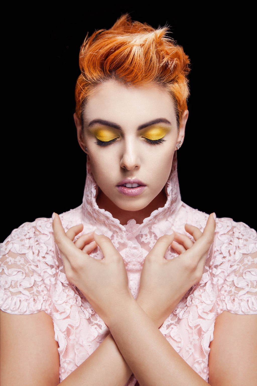 Editorial beauty: graphic yellow eye with sculpted copper hair